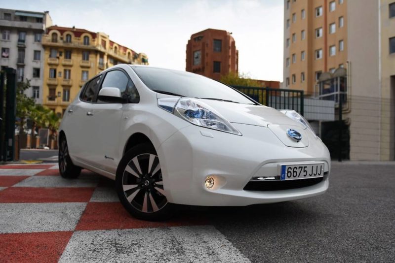 White nissan's leaf on the street